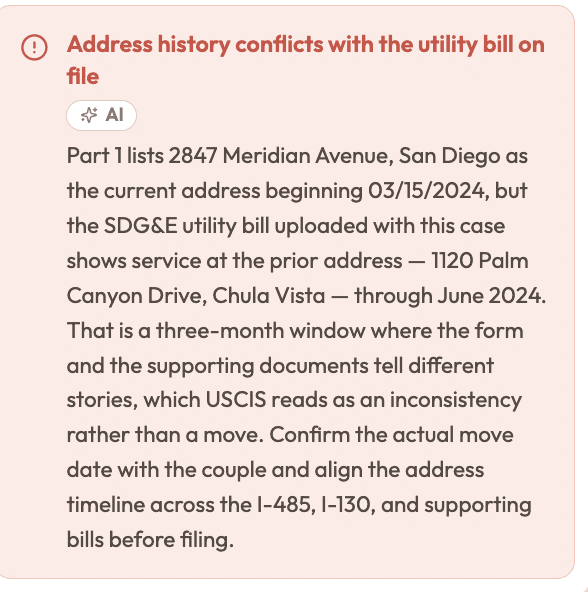 Close-up of the AI review note: Part 1 lists 2847 Meridian Avenue, San Diego as the current address beginning 03/15/2024, but the SDG&E utility bill uploaded with this case shows service at the prior address — 1120 Palm Canyon Drive, Chula Vista — through June 2024. That is a three-month window where the form and the supporting documents tell different stories, which USCIS reads as an inconsistency rather than a move.
